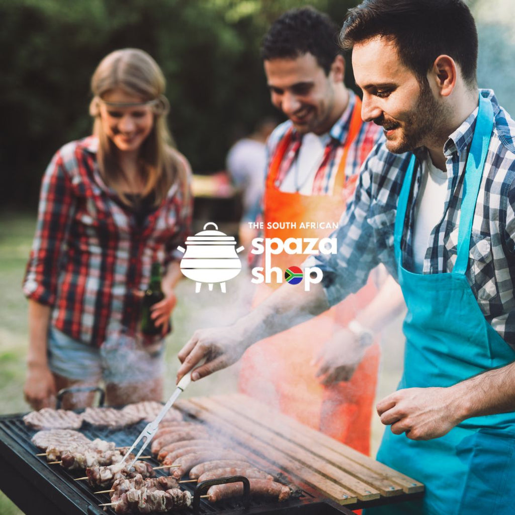 South African braai in a UK garden with friends cooking boerewors over open flame, authentic barbecue experience with The South African Spaza Shop.