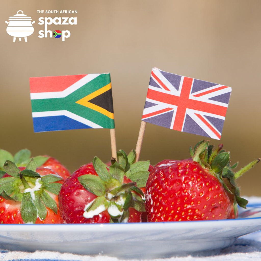 South African and British flags on strawberries – symbolising cultural fusion and celebrating South African heritage in the UK with food from The South African Spaza Shop.
